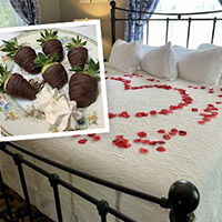 rose petals and chocolate covered strawberries