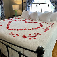 bed with rose petals